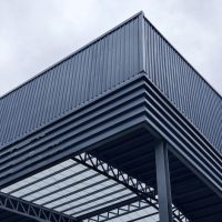 large-building-with-m Roofing Materials